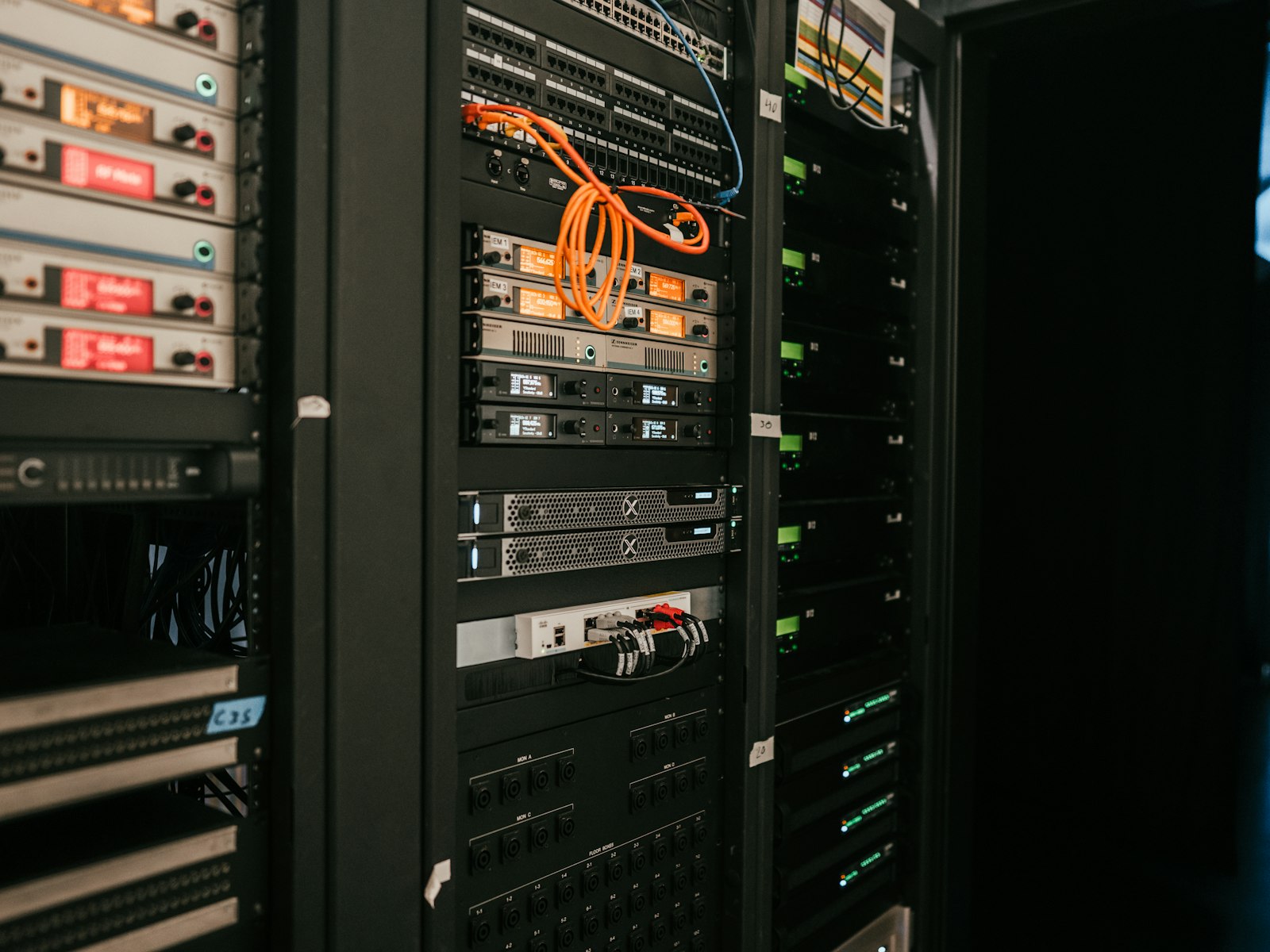 A server rack with network cables plugged in